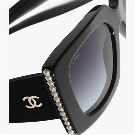 black chanel sunglasses with chanel on the top|chanel sunglasses online shop.